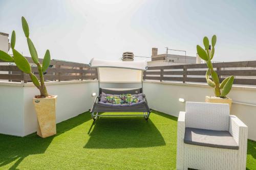 Posezení v ubytování Il Panoramico - Terrazza e Jacuzzi