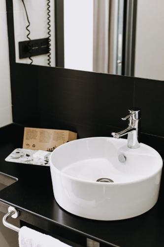 Ein Badezimmer in der Unterkunft Hotel K10
