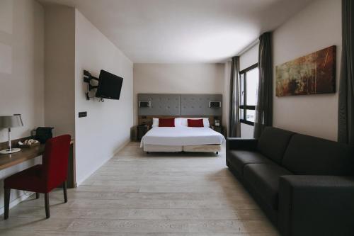 Ein Bett oder Betten in einem Zimmer der Unterkunft Hotel K10