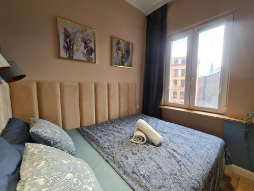 Posteľ alebo postele v izbe v ubytovaní Perfect Stay - "Apartament Zamkowy" - parking place