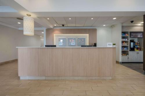 a lobby with a reception counter in a hospital at Hilton Garden Inn Rockford in Rockford