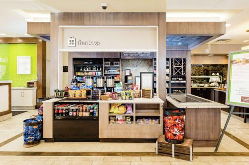 a store with a counter with food and drinks at Hilton Garden Inn Exton-West Chester in Exton