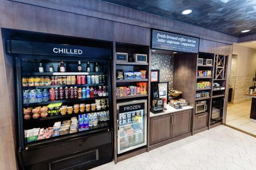 a food section of a grocery store with a chilled refrigerator at Hilton Garden Inn Exton-West Chester in Exton