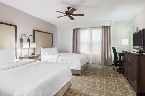 Ένα ή περισσότερα κρεβάτια σε δωμάτιο στο Homewood Suites by Hilton Raleigh/Crabtree Valley