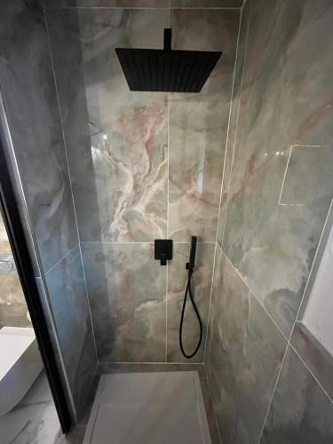Ένα μπάνιο στο appart hôtel le 8 LE DUPLEX