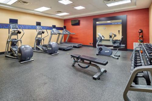 a gym with several treadmills and cardio machines at Hampton Inn & Suites Waco-South in Waco