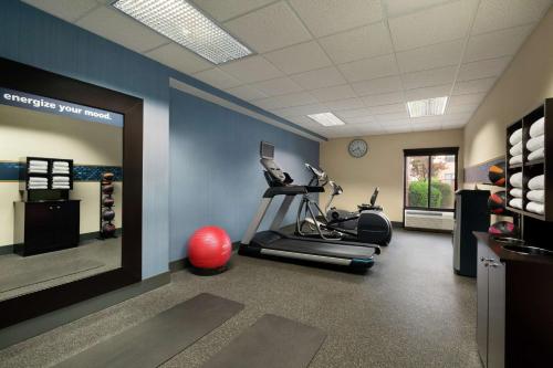 a gym with a treadmill and a exercise ball at Hampton Inn Sedona in Sedona