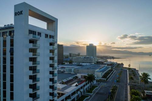 a view of a city with a tall building at ROK Hotel Kingston Tapestry Collection By Hilton in Kingston