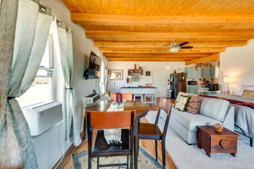 a living room with a table and a couch at Pet-Friendly El Prado Vacation Rental with Views! in El Prado