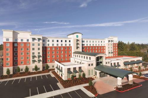 a rendering of a hotel with a parking lot at Embassy Suites Portland/Hillsboro in Hillsboro