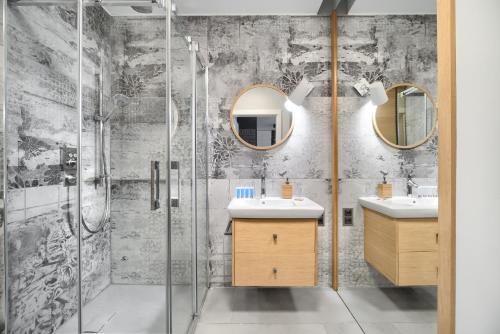Ένα μπάνιο στο Poznań Grafitowa Modern Apartment