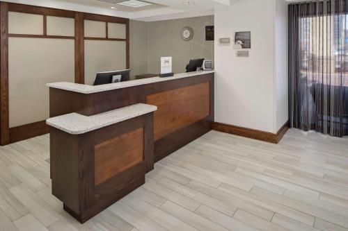 a lobby with a reception desk in a hospital at Homewood Suites by Hilton Minneapolis-Mall Of America in Bloomington