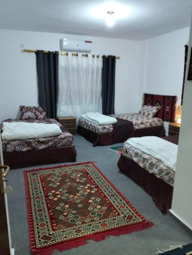 Ένα ή περισσότερα κρεβάτια σε δωμάτιο στο Petra Magic Guest House
