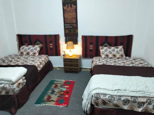 Ένα ή περισσότερα κρεβάτια σε δωμάτιο στο Petra Magic Guest House