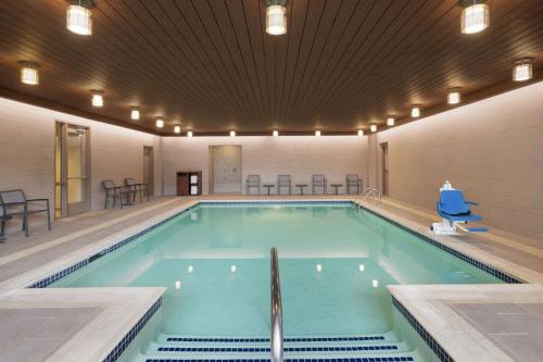 a large swimming pool in a building at Hampton Inn Portland Downtown Waterfront in Portland