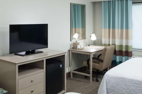 TV a/nebo společenská místnost v ubytování Hampton Inn & Suites by Hilton Carolina Beach Oceanfront