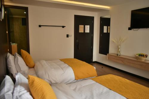 Postel nebo postele na pokoji v ubytování Hotel Vaway