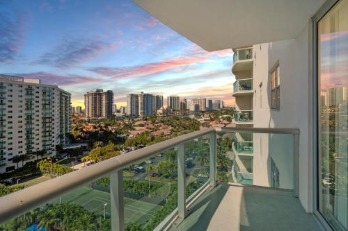 a balcony with a view of the city at ⌘Family Beach Home w Amazing Water Views - Upgraded Unit ⌘ in Miami Beach