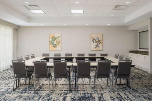 a conference room with a large table and chairs at Homewood Suites by Hilton Knoxville West at Turkey Creek in Knoxville