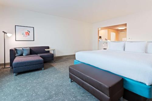 Postel nebo postele na pokoji v ubytování Hilton Garden Inn Homestead