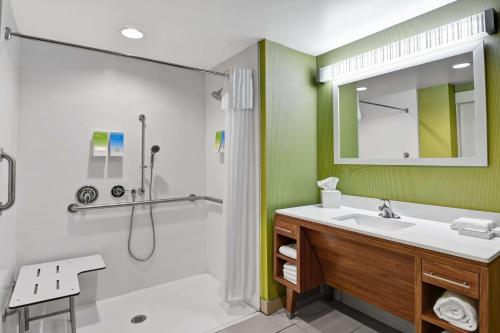a bathroom with a sink and a shower at Home2 Suites By Hilton Summerville in Summerville