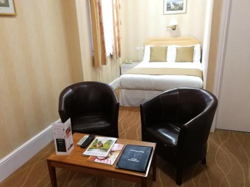 Postel nebo postele na pokoji v ubytování The Devoncourt Resort