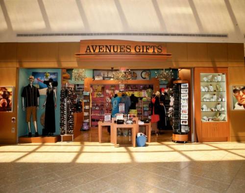 a store front of a clothing store with clothes on display at Hilton Miami Airport Blue Lagoon in Miami
