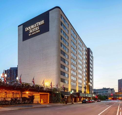 a building with a sign on the side of it at DoubleTree Suites by Hilton Minneapolis Downtown in Minneapolis