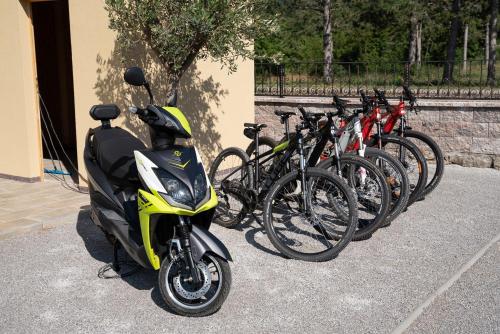 a row of bikes parked next to each other at Apartments Kras 24 with Pool in Sežana