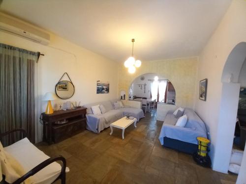 En eller flere senge i et værelse på Nikos Asklipios Paros