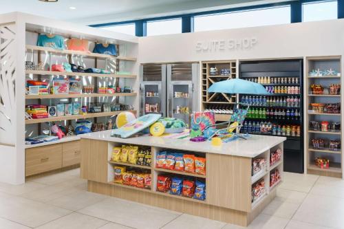 a sun shop with a counter in a store at Homewood Suites by Hilton Myrtle Beach Oceanfront in Myrtle Beach