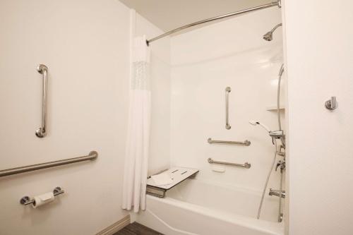 a bathroom with a shower and a tub at Hampton Inn & Suites Camarillo in Camarillo