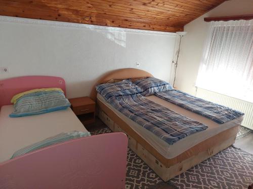 Кровать или кровати в номере Oaza Deli
