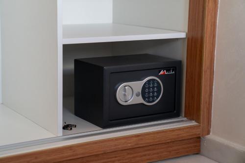 a microwave oven sitting inside of a cabinet at CASA DEL TITO in Oulad Akkou