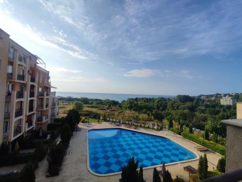a view of a swimming pool from a building at Byala Apartments BSR 7 in Byala