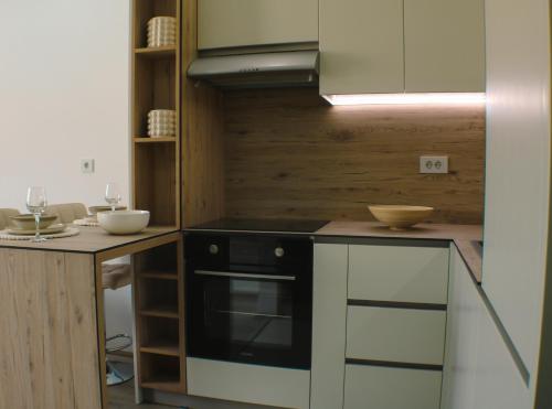 Η κουζίνα ή μικρή κουζίνα στο apartman gold Jagodina