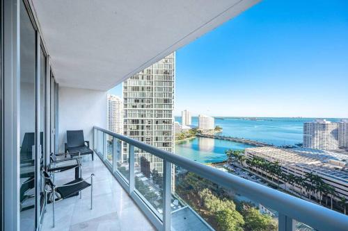 a balcony with a view of the ocean in a building at ICON & W Hotel Waterfront 22nd Floor Top Spa in Miami