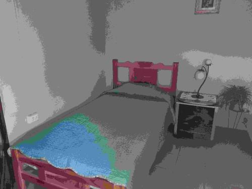 a drawing of a bedroom with a bed with a rainbow at Cabaña El Cielo de María in Boquete