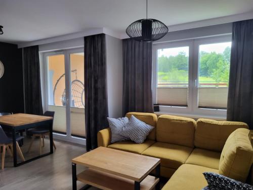 Χώρος καθιστικού στο Widok - Apartament w Węgorzewie