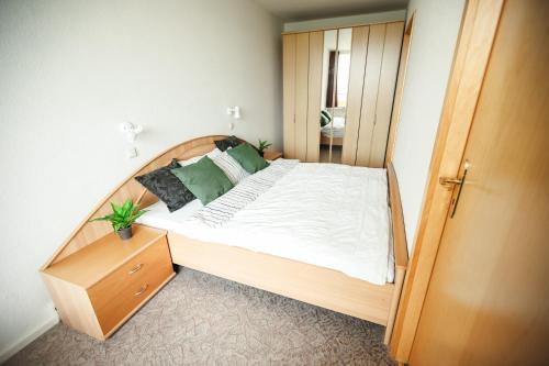 Postel nebo postele na pokoji v ubytování Hohegeiß_548, Schwimmbad und Sauna