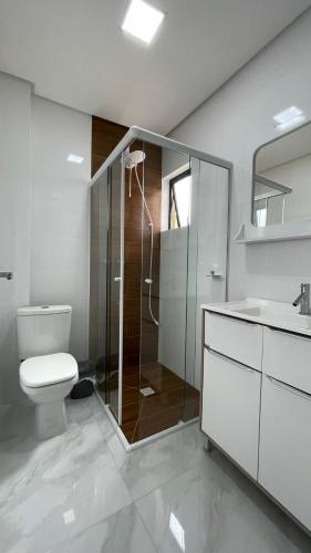 Bathroom sa Apto Girassol - Moderno,confortável e com excelente localização!