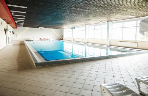 Majoituspaikassa Apartment 540, Oberharz, mit Schwimmbad und Sauna tai sen lähellä sijaitseva uima-allas