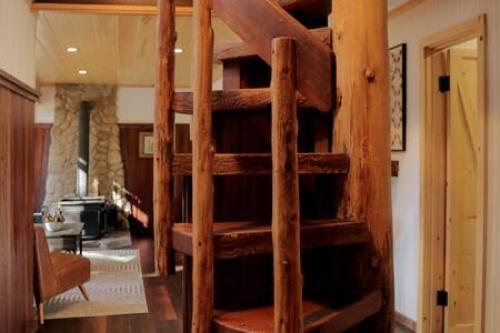 a wooden bunk bed in a room at Hobbit House - Charming In Town in Idyllwild