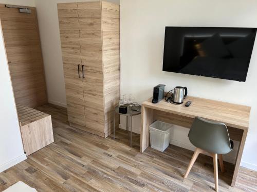 Příslušenství pro přípravu čaje a kávy v ubytování NB Apartments