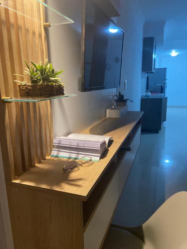 a bathroom counter with a sink with glasses on it at Edificio del Sur in Santiago del Estero