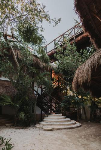 Ein Garten an der Unterkunft Las Nubes de Holbox