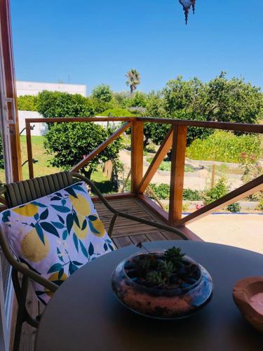 a bowl of food on a table on a balcony at Varzea Nature in Torres Vedras