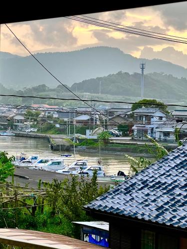a view of a marina with boats in the water at Shirahama in Miyazaki