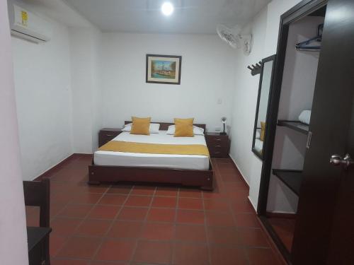 Hotel Colonial San Felipeにあるベッド