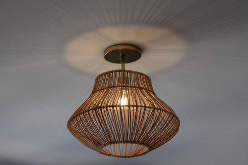 a brown light hanging from a ceiling at Brand New Stylish 1BDR In Heart Of Rittenhouse Sq. Hosted By StayRafa in Philadelphia